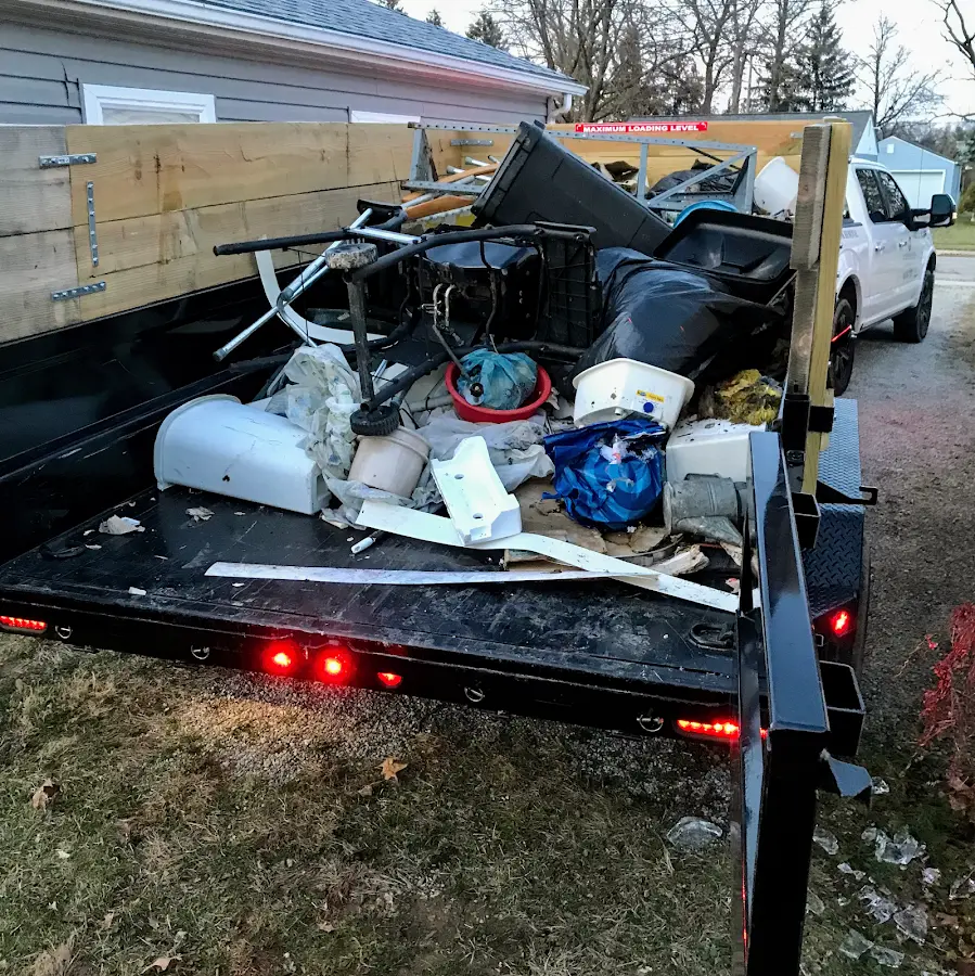 Roll-off dumpster delivered to a residential driveway in Marshall